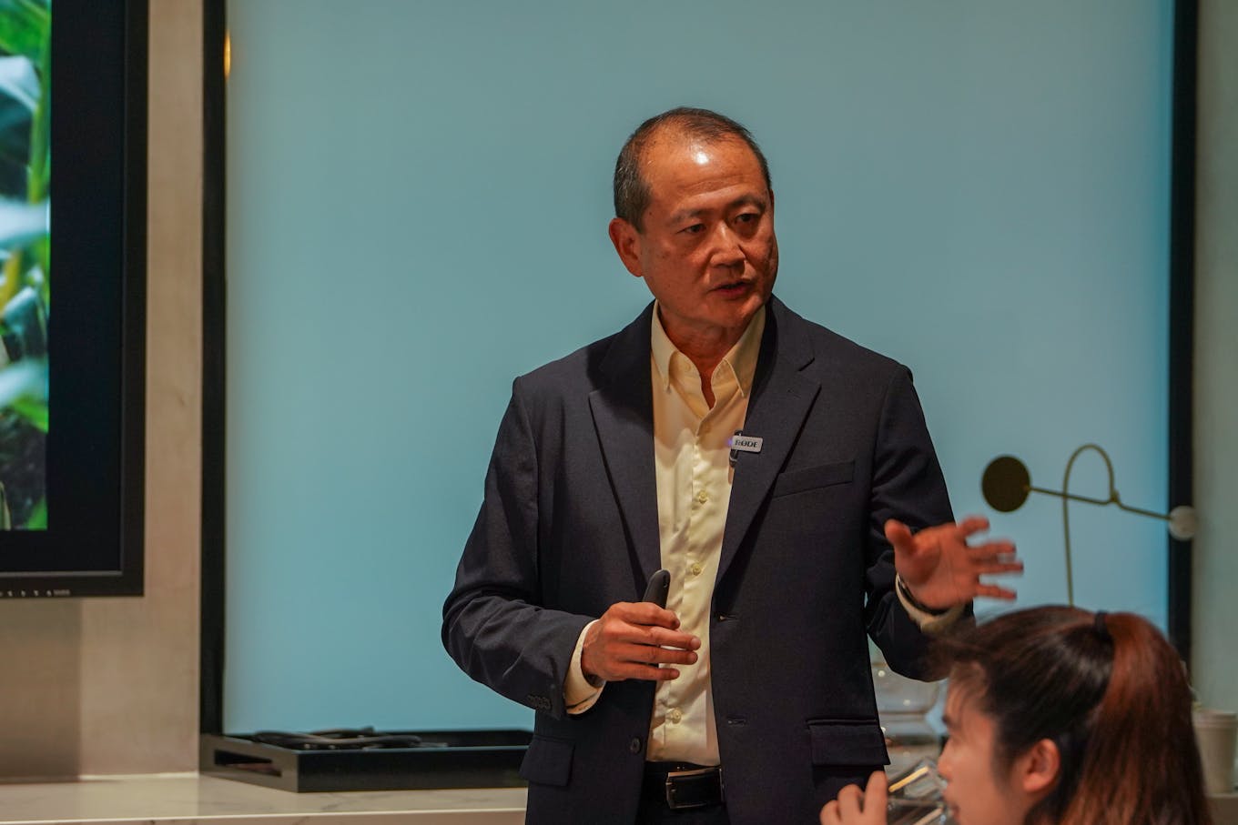 Andrew Buay of Singtel speaking at Eco-Business' Sharpening event